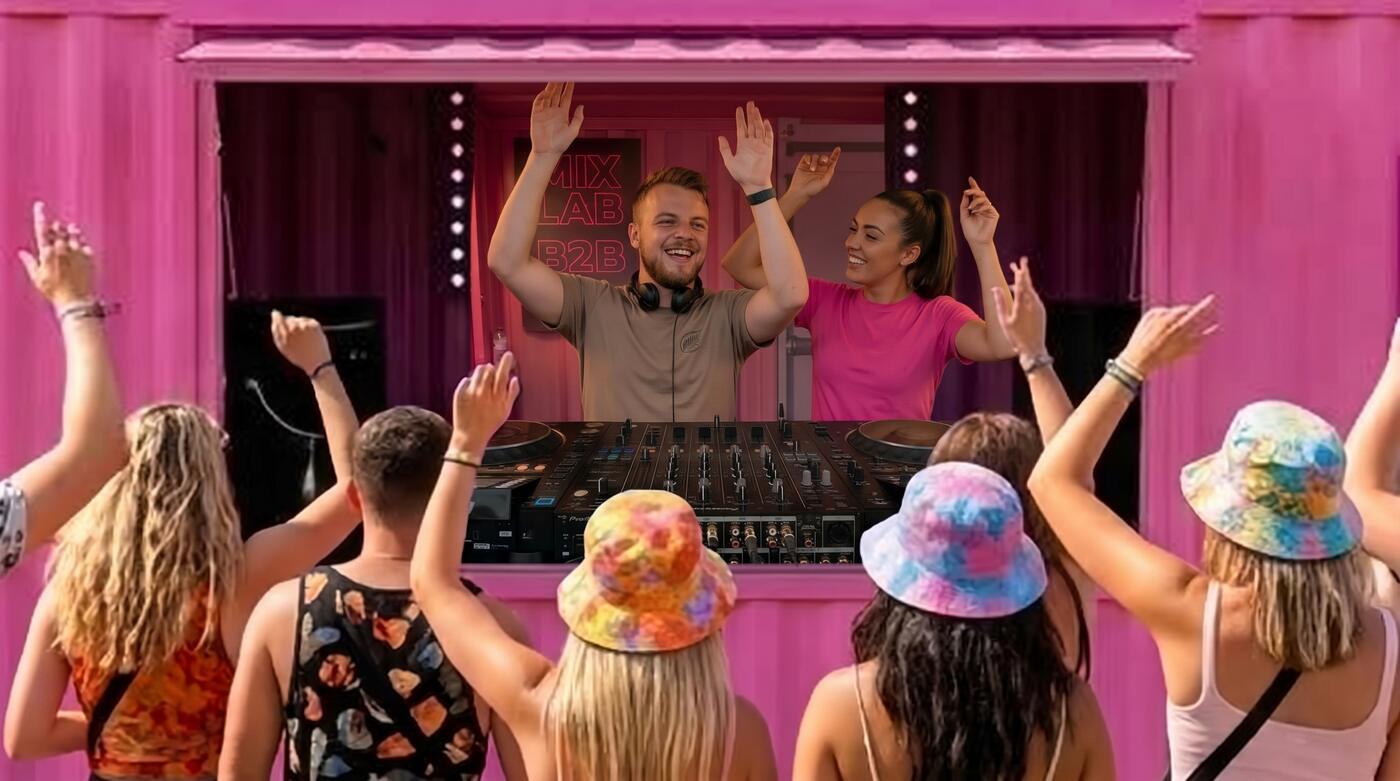 Friends with their hands up in front of an open booth