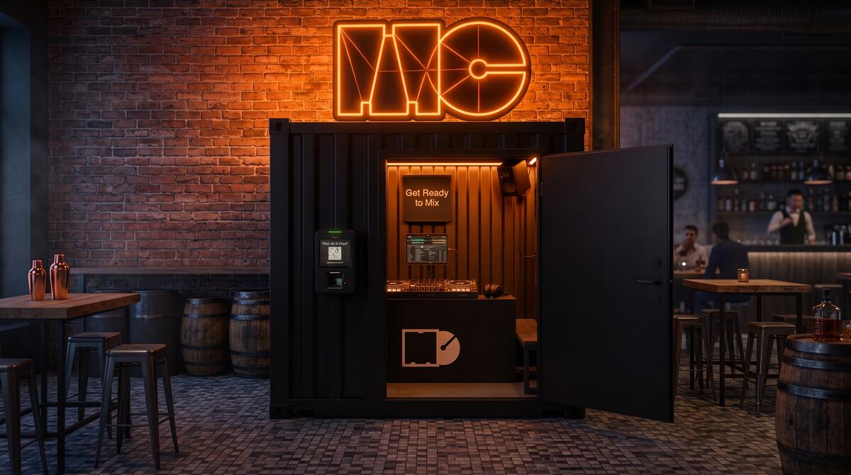 A MixClub booth in a bar next to tables and barrels